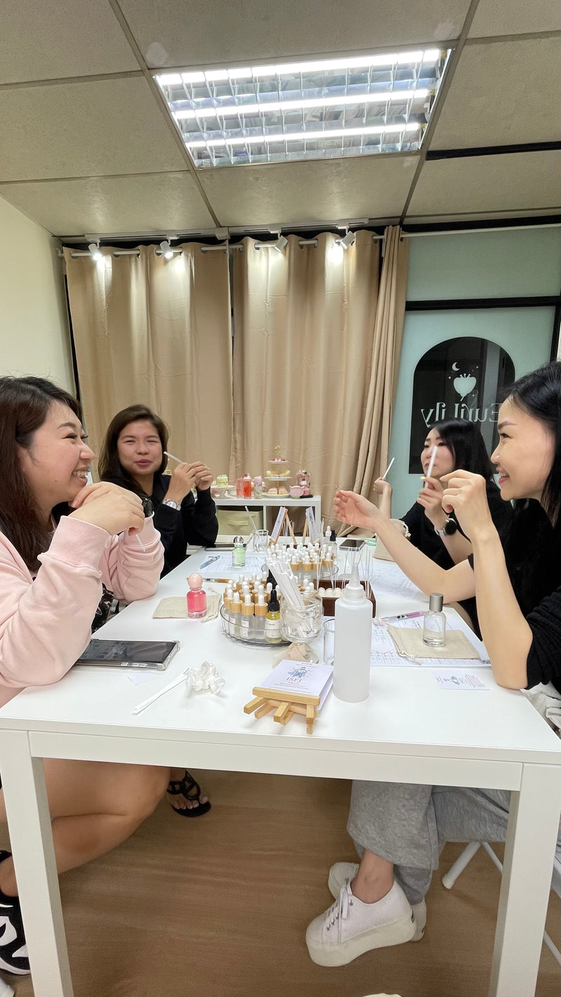 Friends exploring different scents during an MBTI perfume experience